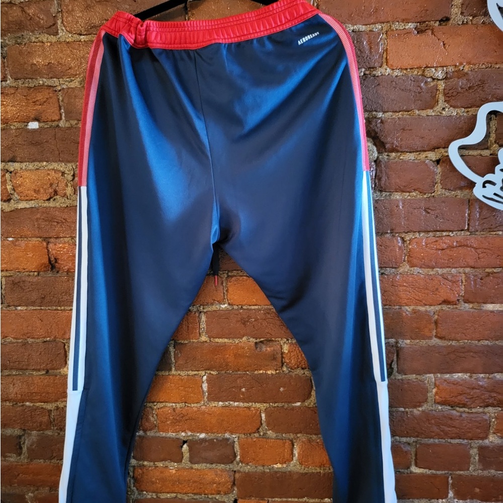 Adidas track pants. Smoke free home. Dry cleaned only.